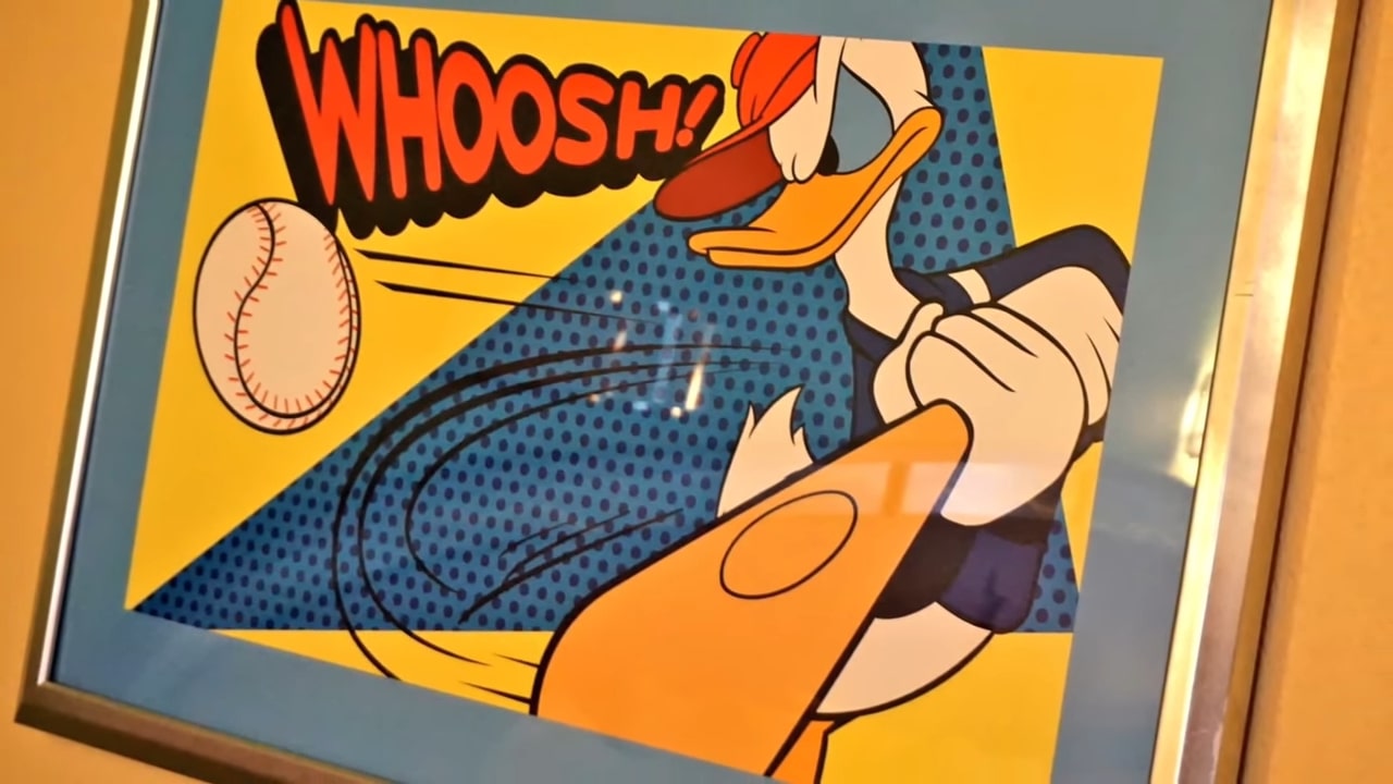 What Is The Best All-Star Resort At Disney World? 10 Disney themed art murals on the lobby wall at the All Star Resort
