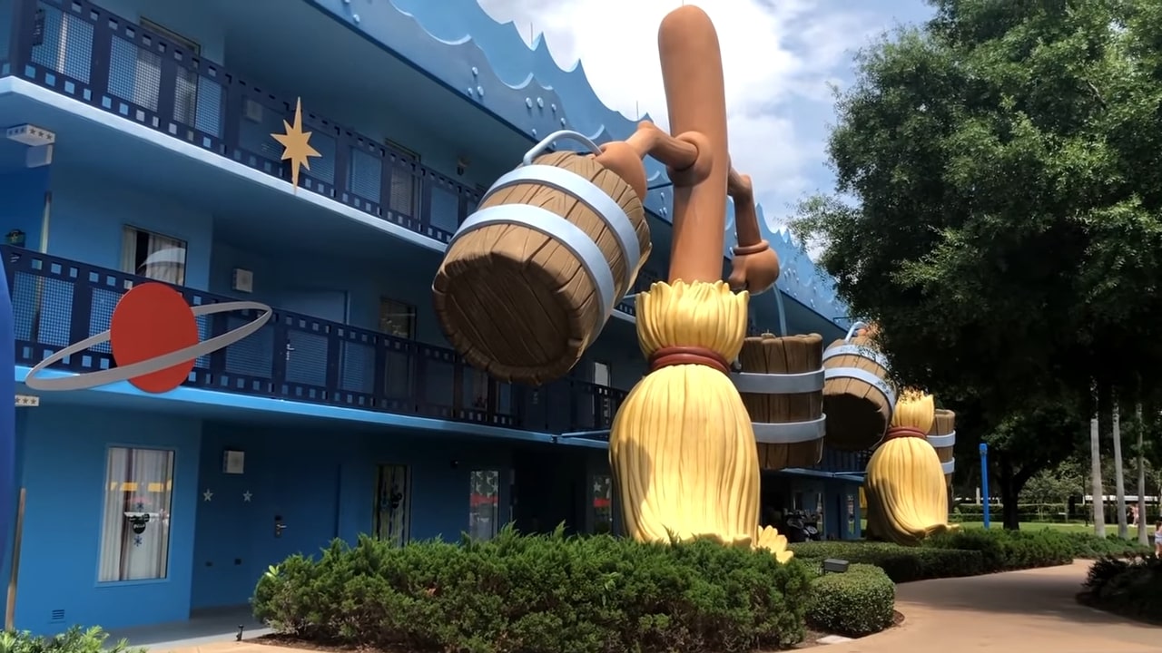 What Is The Best All-Star Resort At Disney World? 2 Giant Sorcerer Apprentice brooms and film strip balconies at Disney All Star Movies Resort